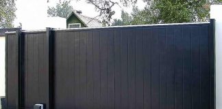 Откатные и распашные ворота для въезда на участок — какие выбрать?