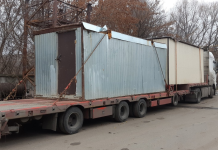 Доставка бытовок и контейнеров низкорамной автоплатформой